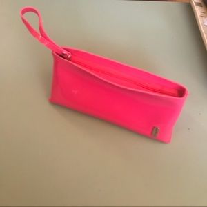 Hot pink Clinique cosmetic case